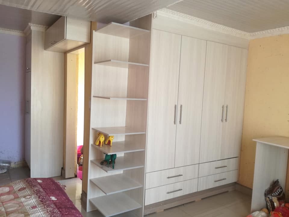 Bedroom cupboards and built-in shelving by PZN Designs