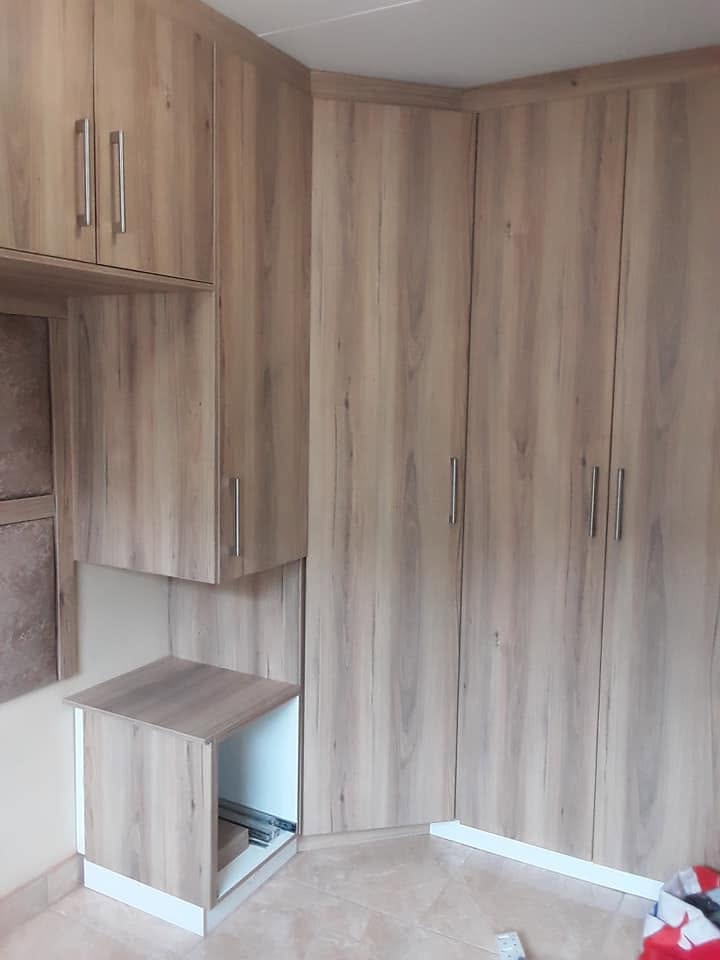 Home office cabinetry and shelving by PZN Designs