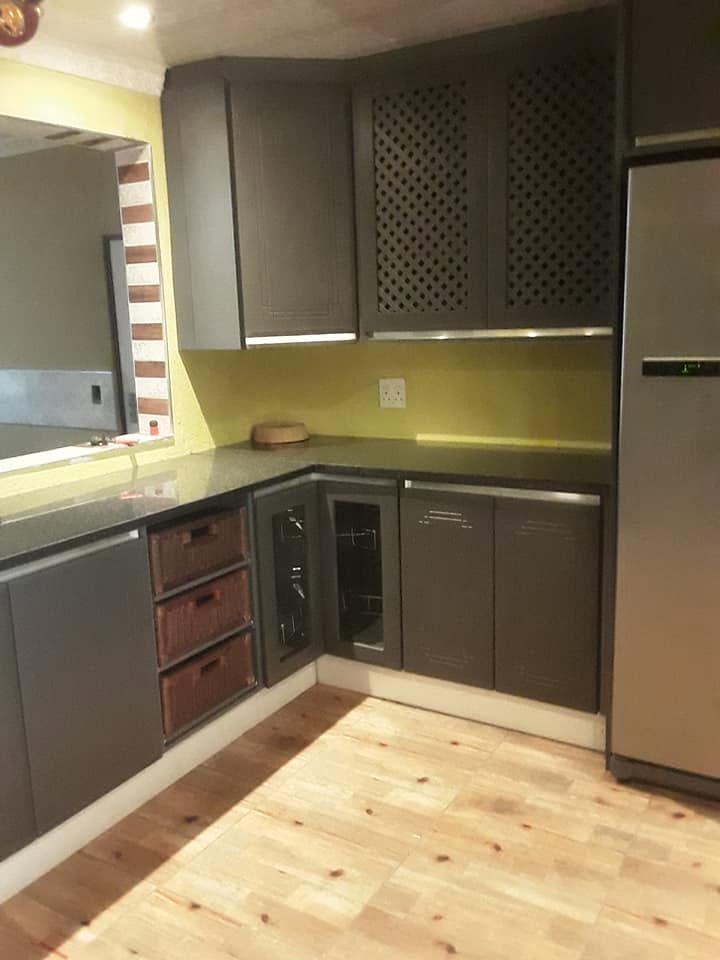 Renovated kitchen cabinetry upgrade by PZN Designs